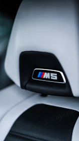 BMW interior dashboard adorned with a subtle yet striking M Performance badge.