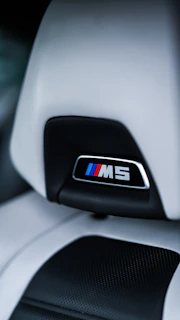 BMW interior dashboard adorned with a subtle yet striking M Performance badge.