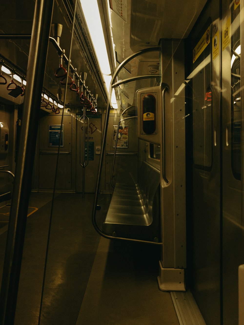 a subway car with its doors open at night