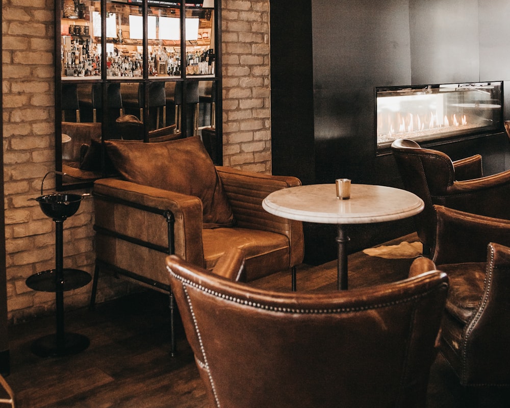 a living room filled with furniture and a fire place