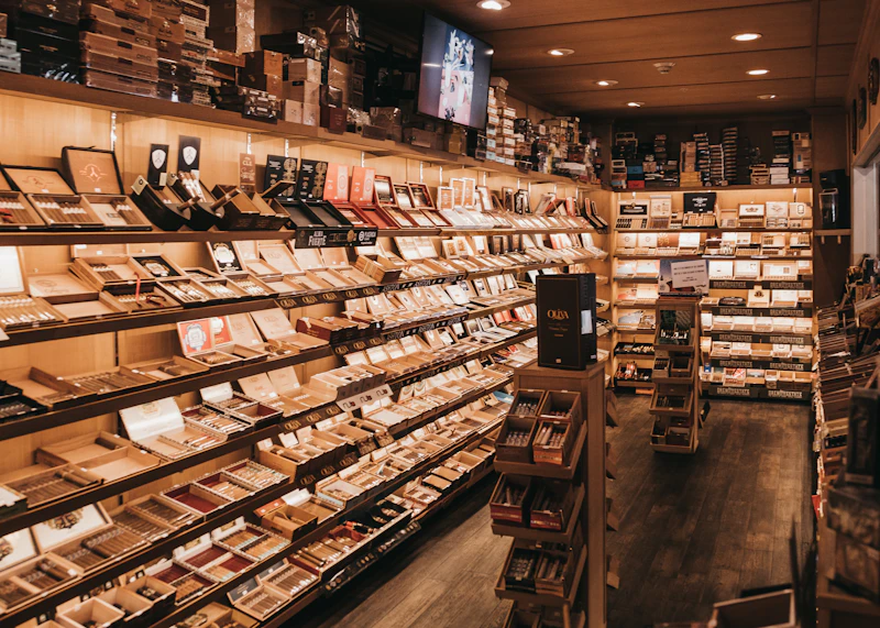 Humidor shelves stocked with premium cigar boxes