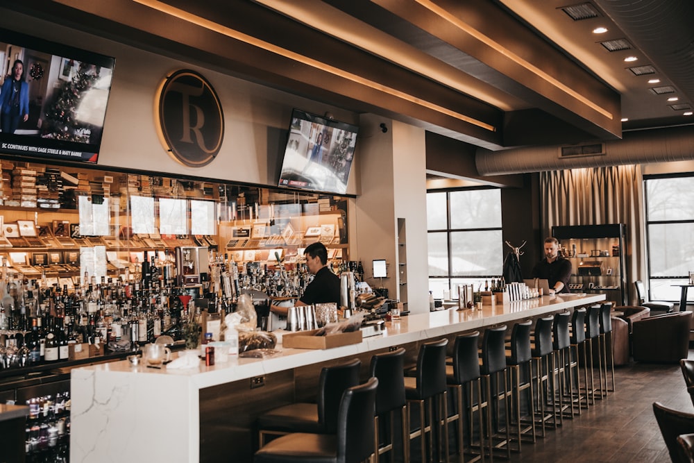 a bar with lots of bottles of liquor