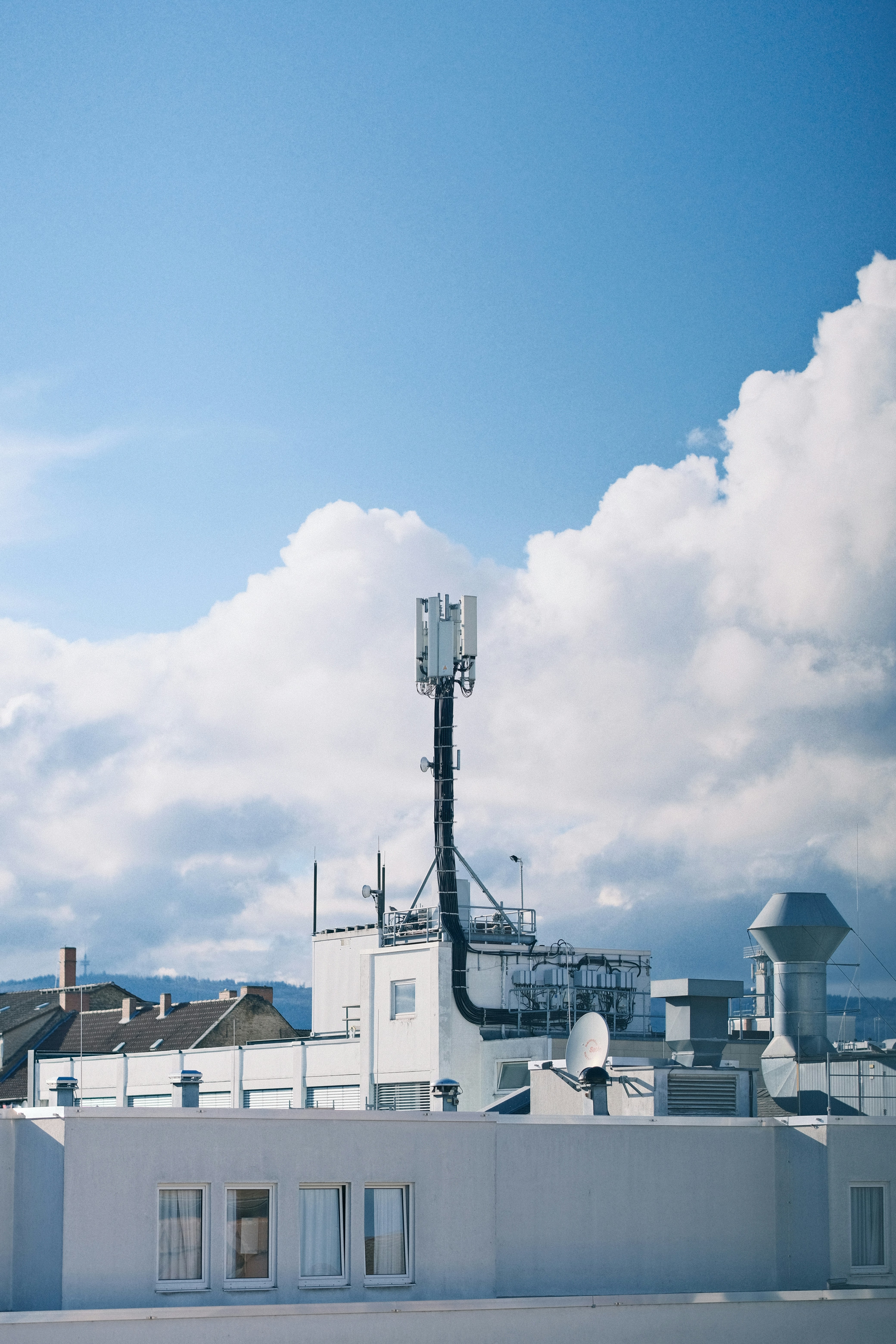 a view of a building with a sky background