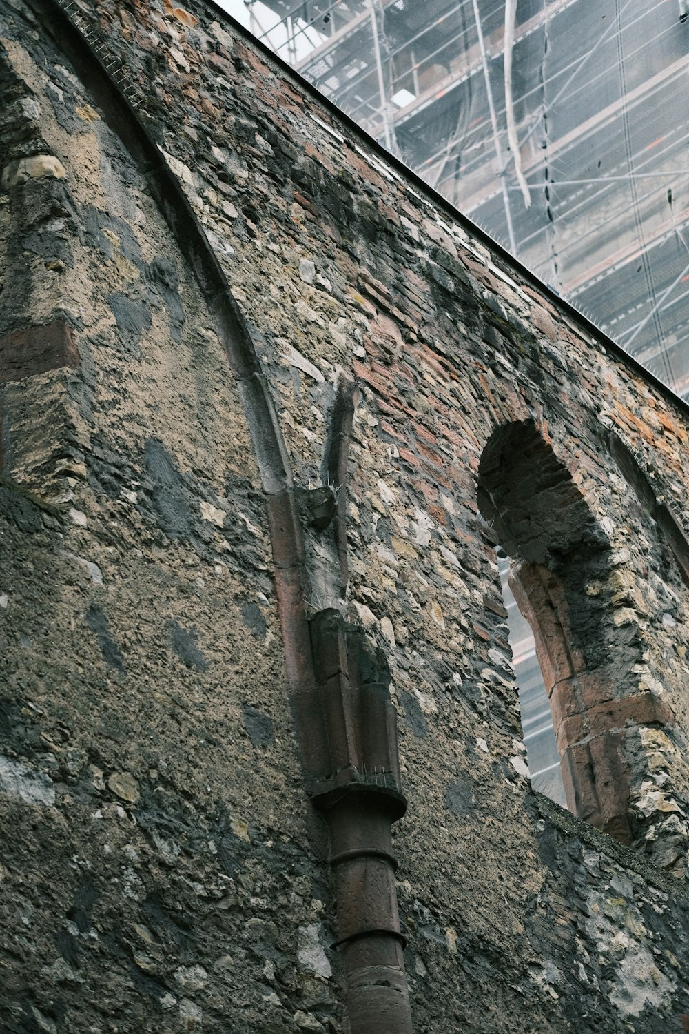 a very old building with a very tall window