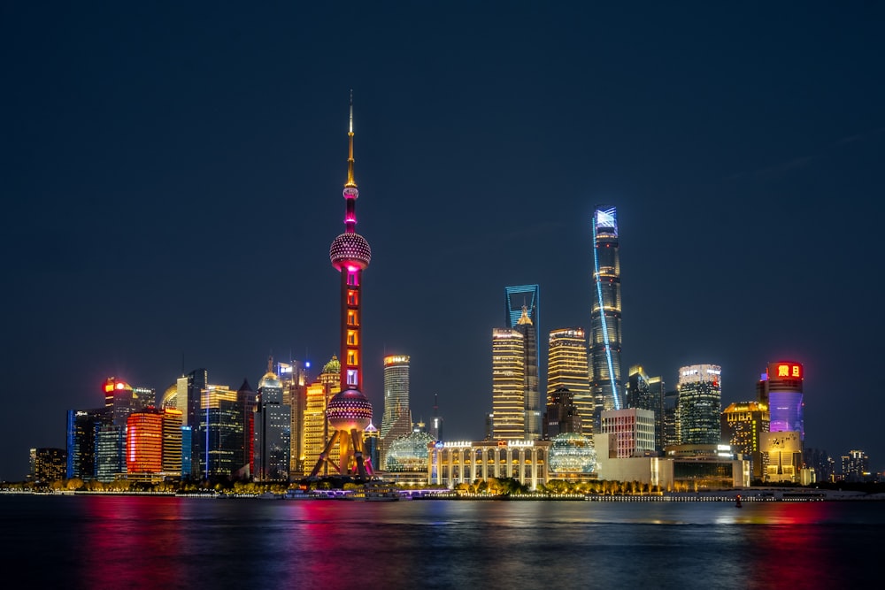 a view of a city at night from across the water