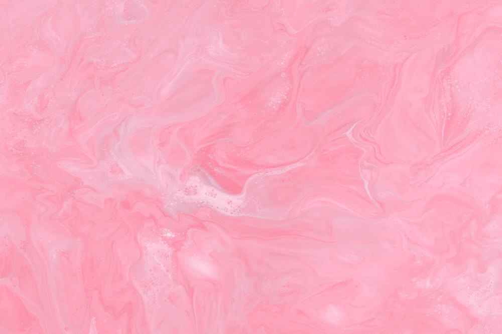 a close up of a pink marble texture