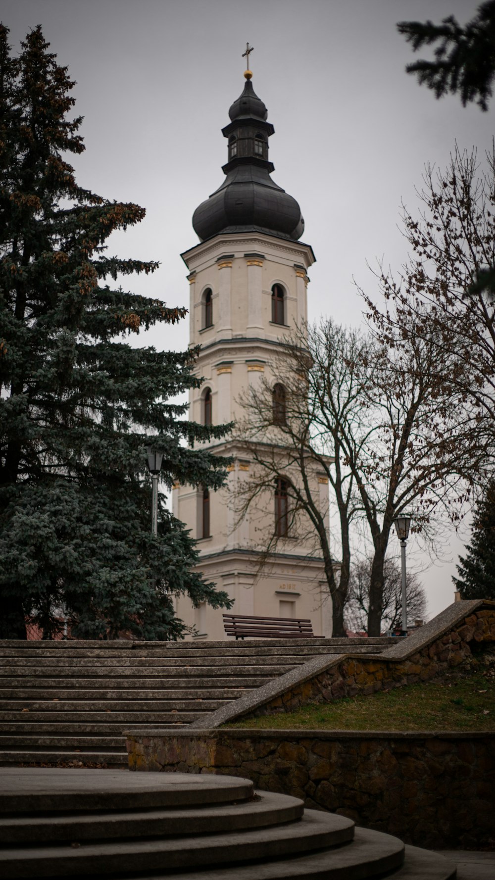 a church steeple with a clock on it