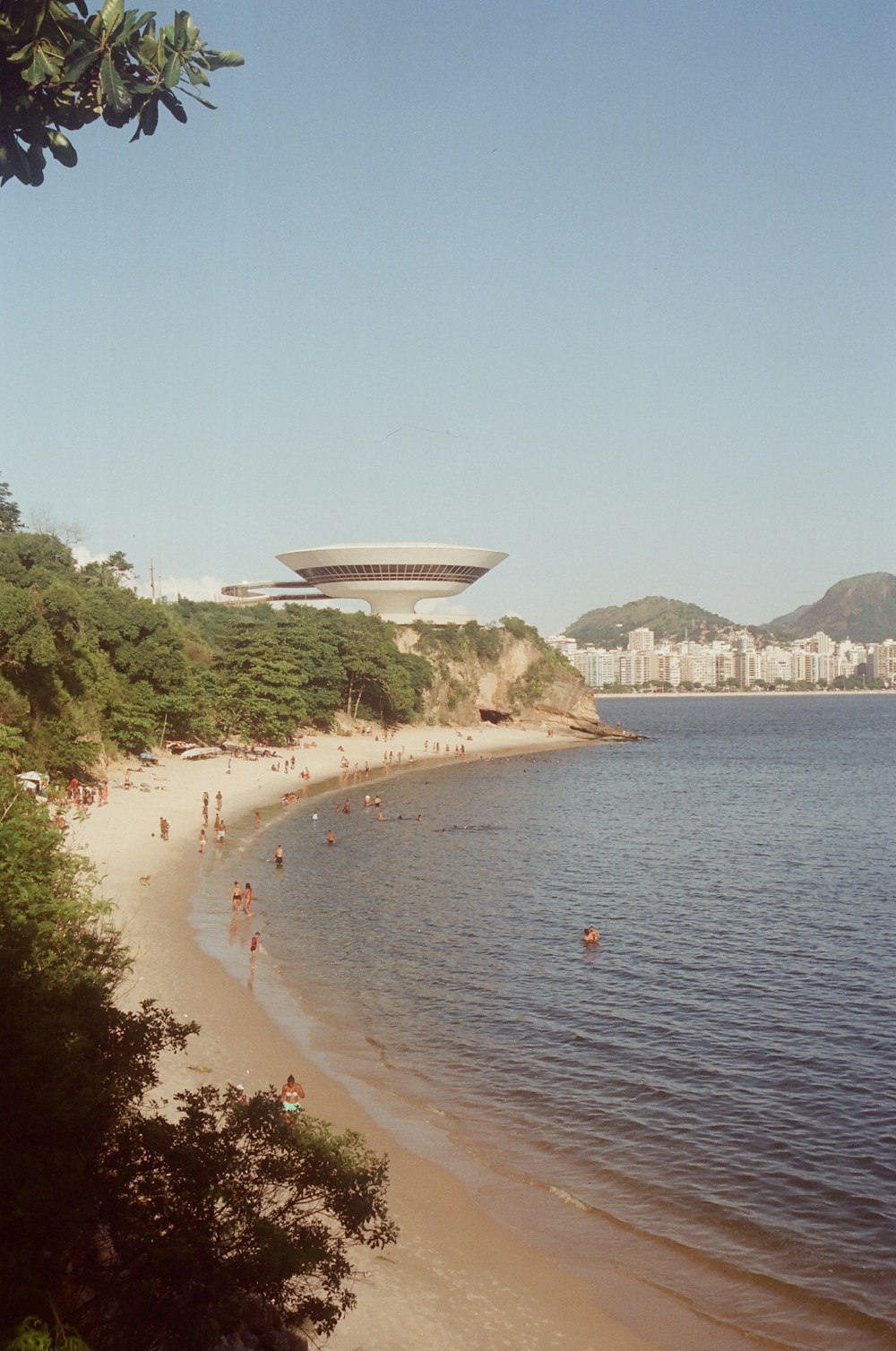 a view of a beach with people on it