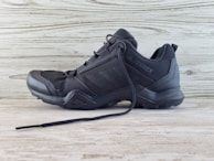 A rugged high-top shoe designed for outdoor activities.