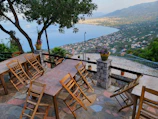 Cozy terrace with outdoor seating and views of the green hills surrounding Viña del Mar.
