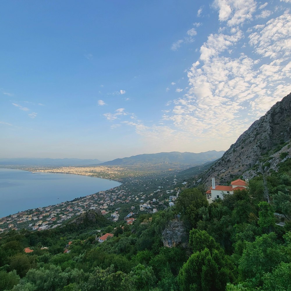 a scenic view of a city and a lake