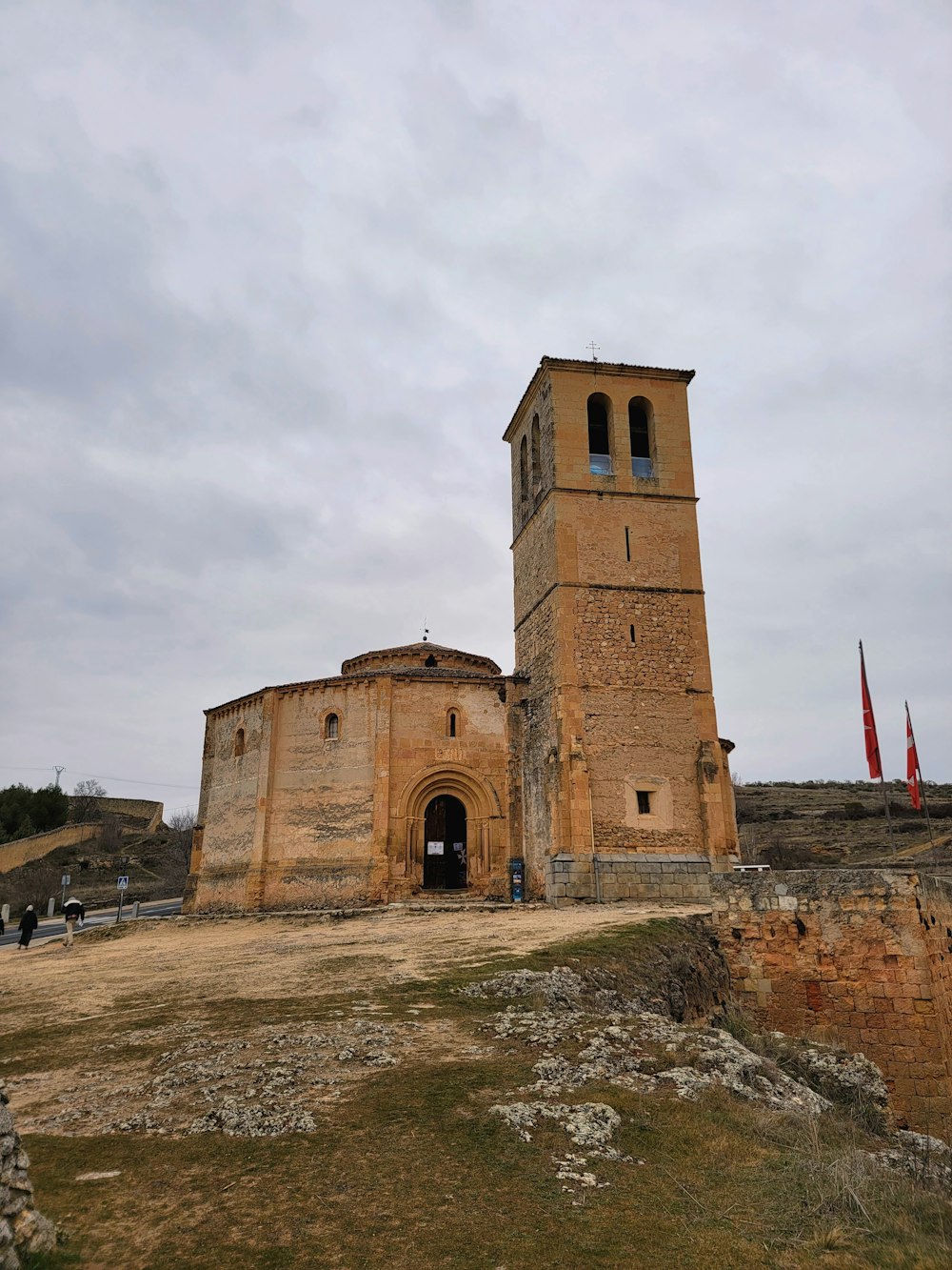 a tall tower with a clock on the top of it