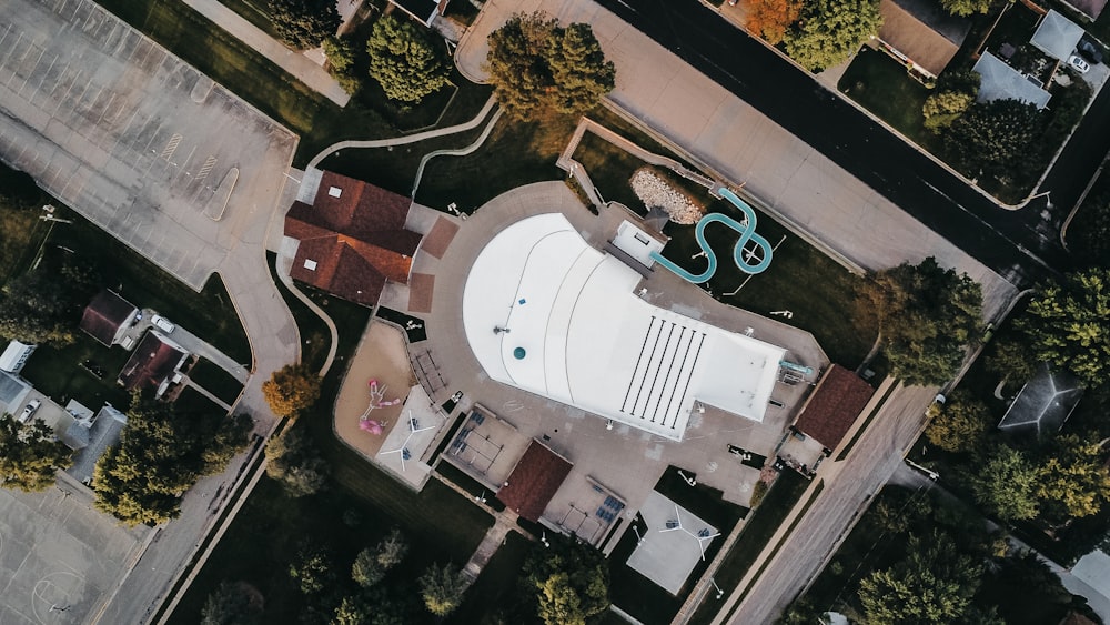 an aerial view of a building with a sky background