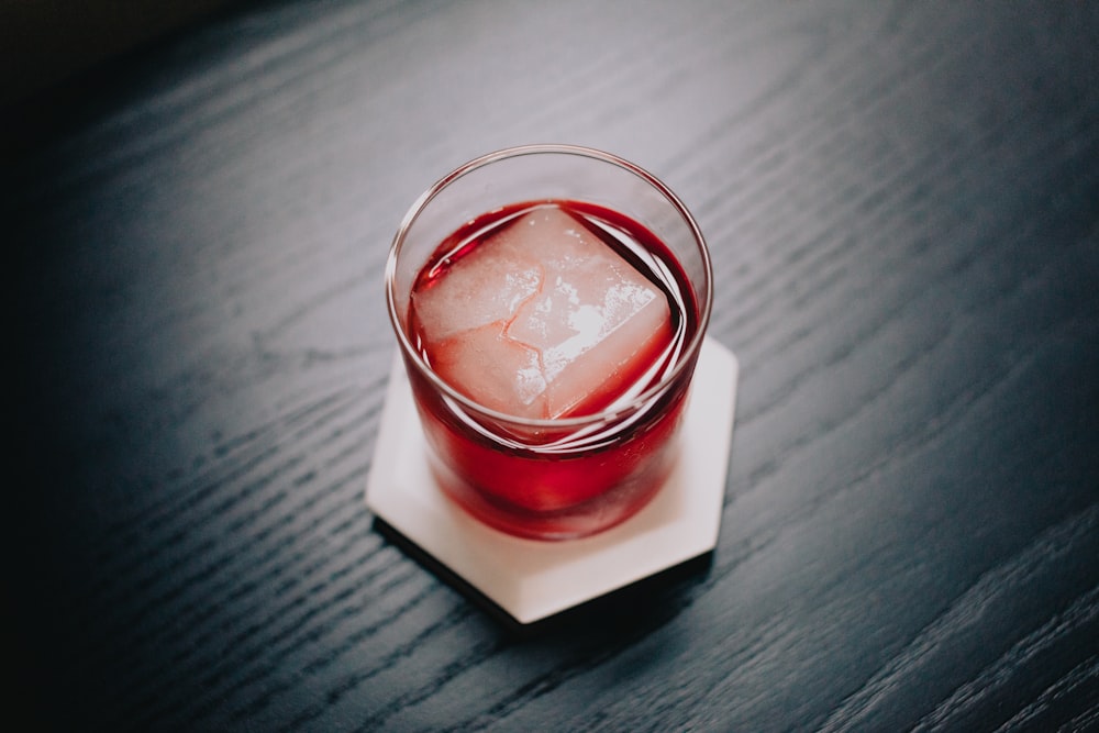 a close up of a drink on a table