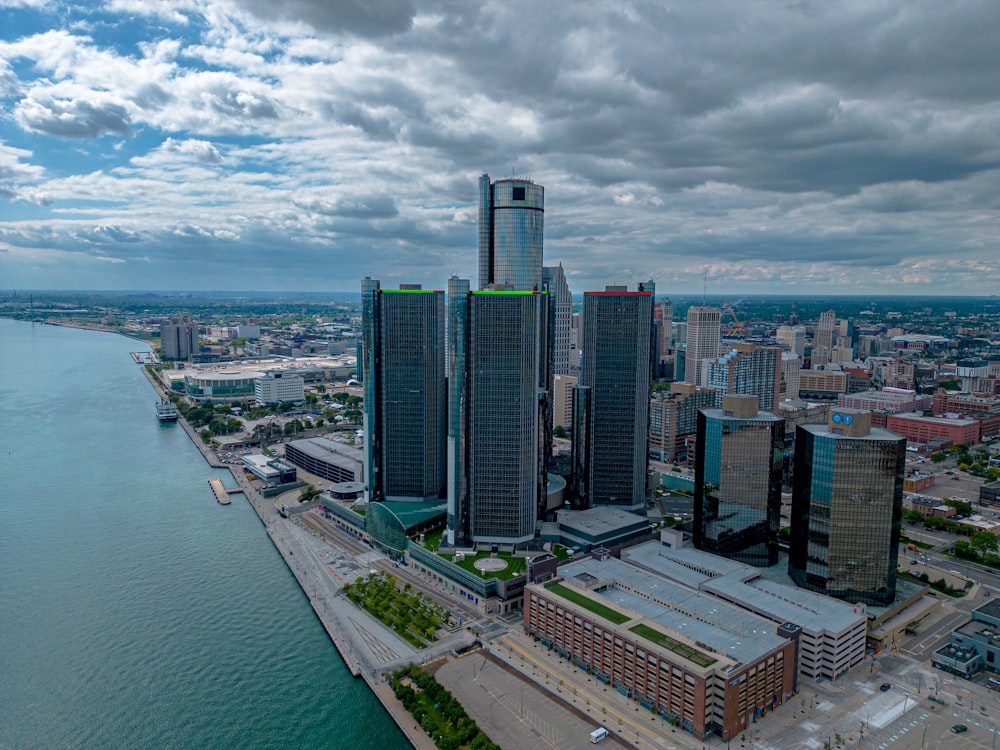 an aerial view of a city and a body of water