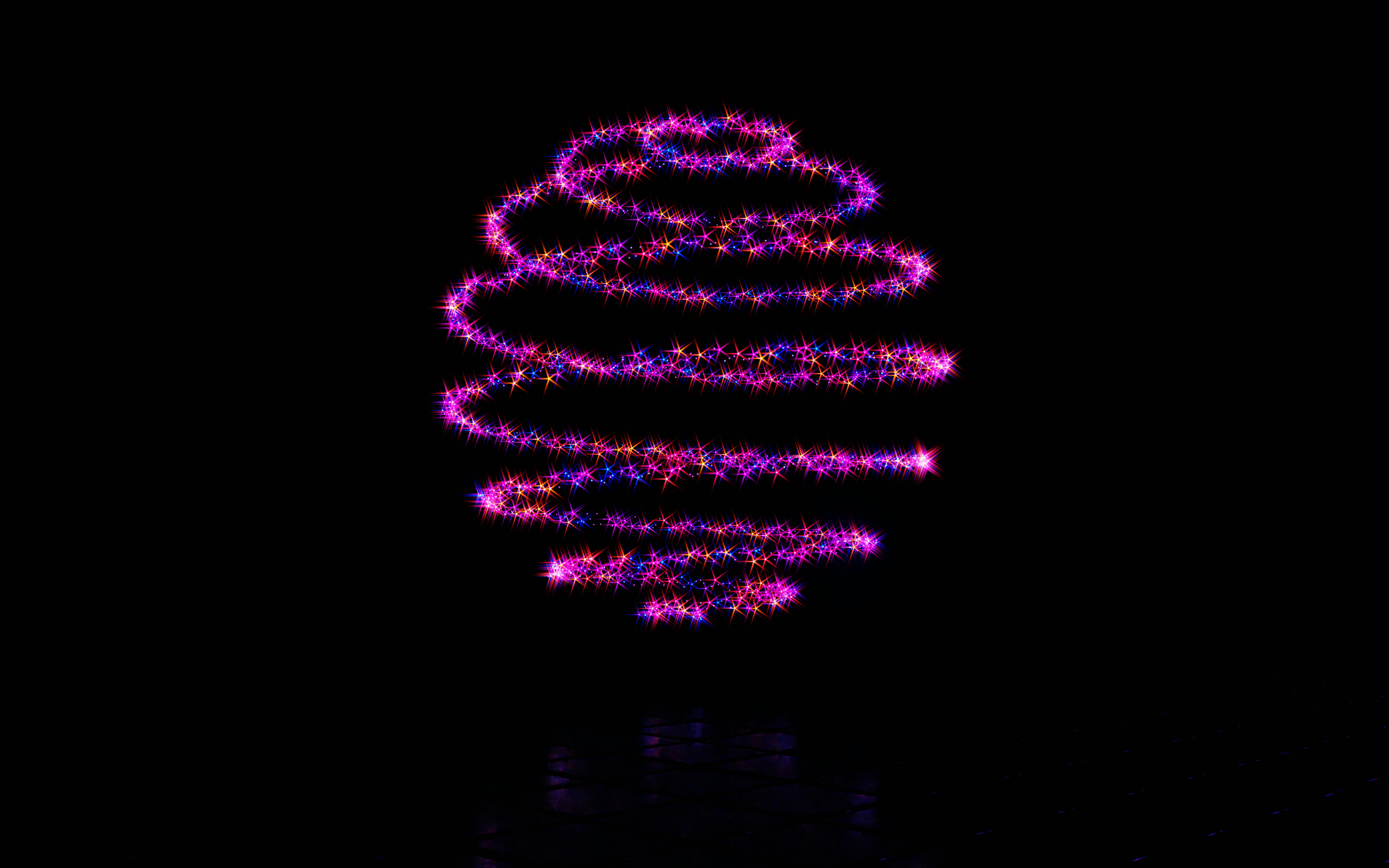 a lit up christmas tree in the dark