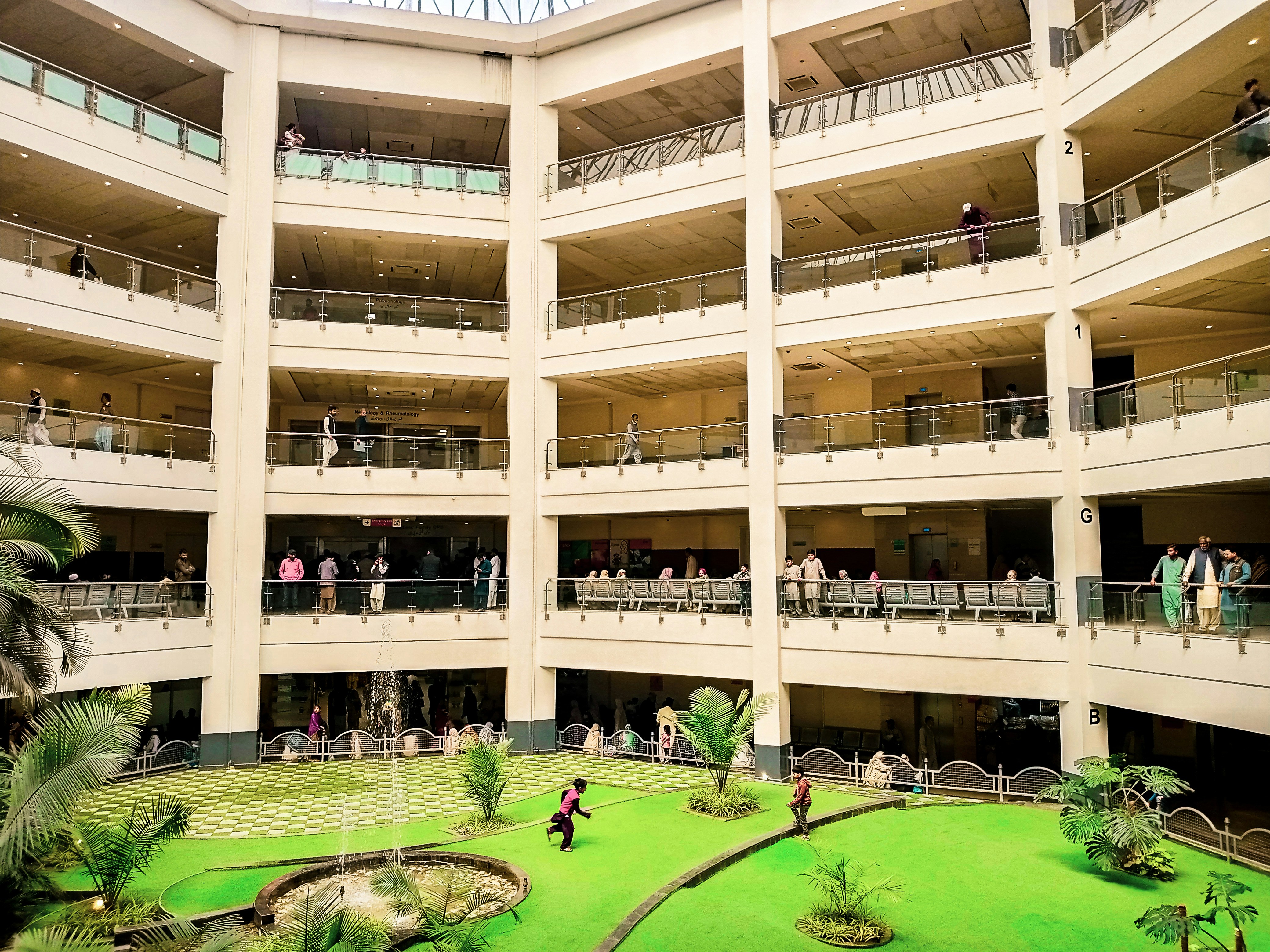 a group of people standing inside of a building