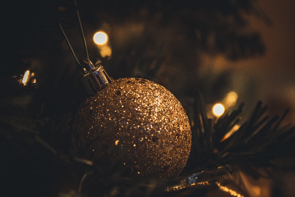 a close up of a christmas ornament on a tree