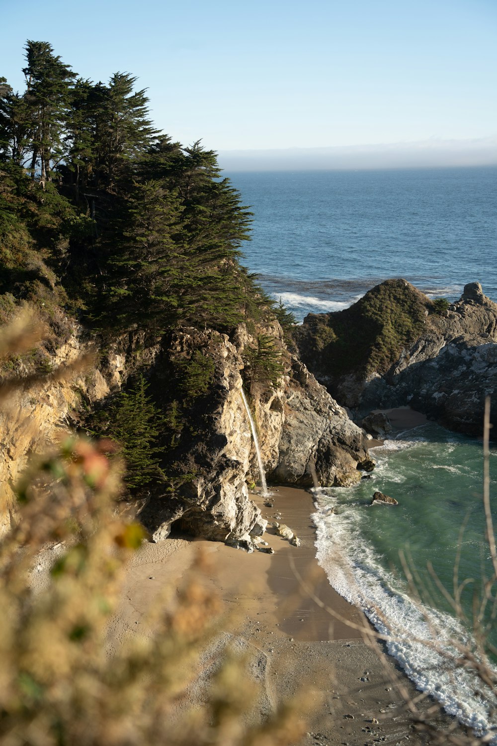 a view of the ocean from a cliff