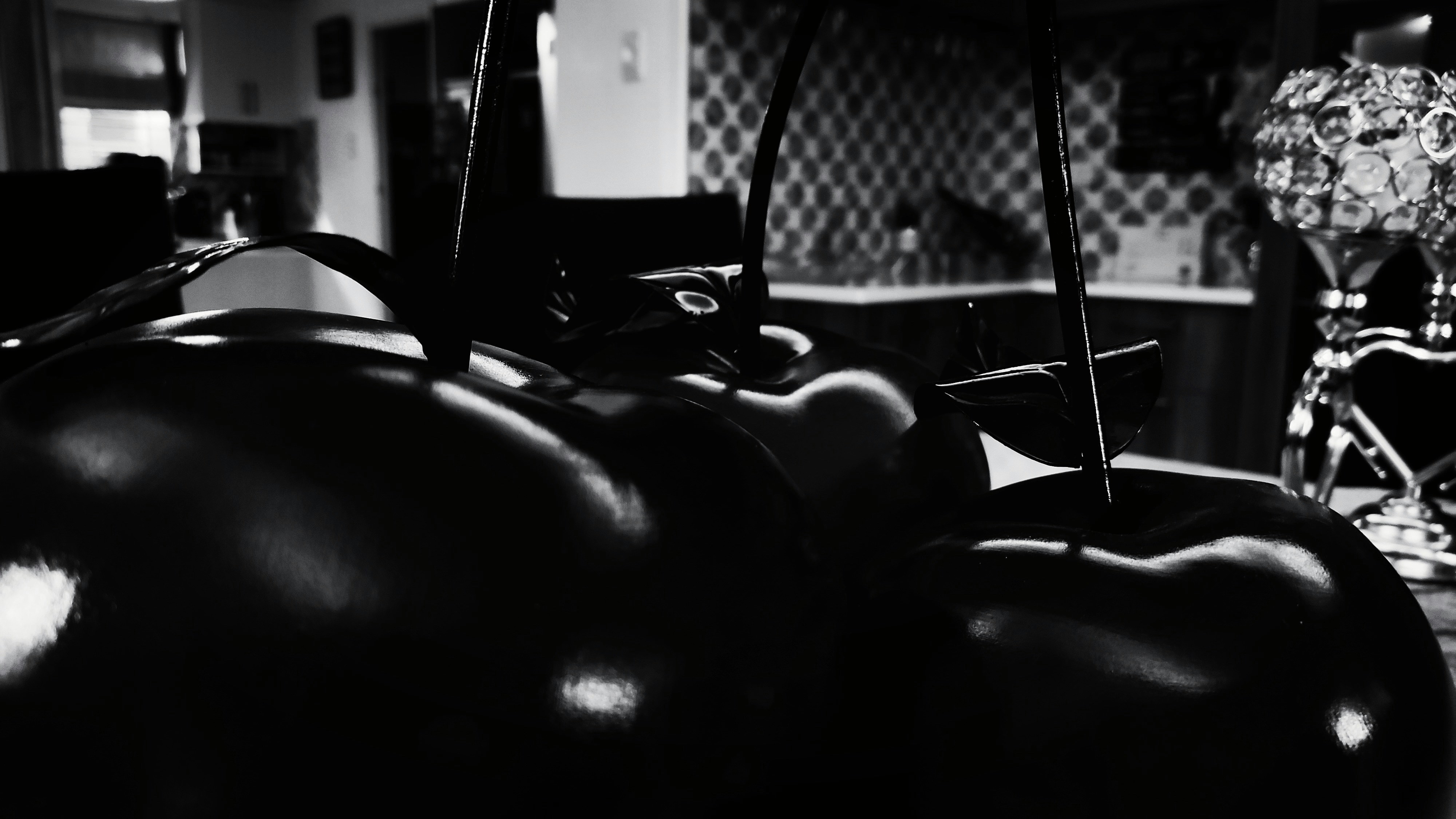 a black and white photo of a kitchen (Photo by JL Merilles on Unsplash)