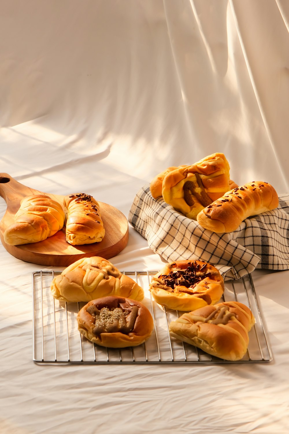 a bunch of breads that are on a rack