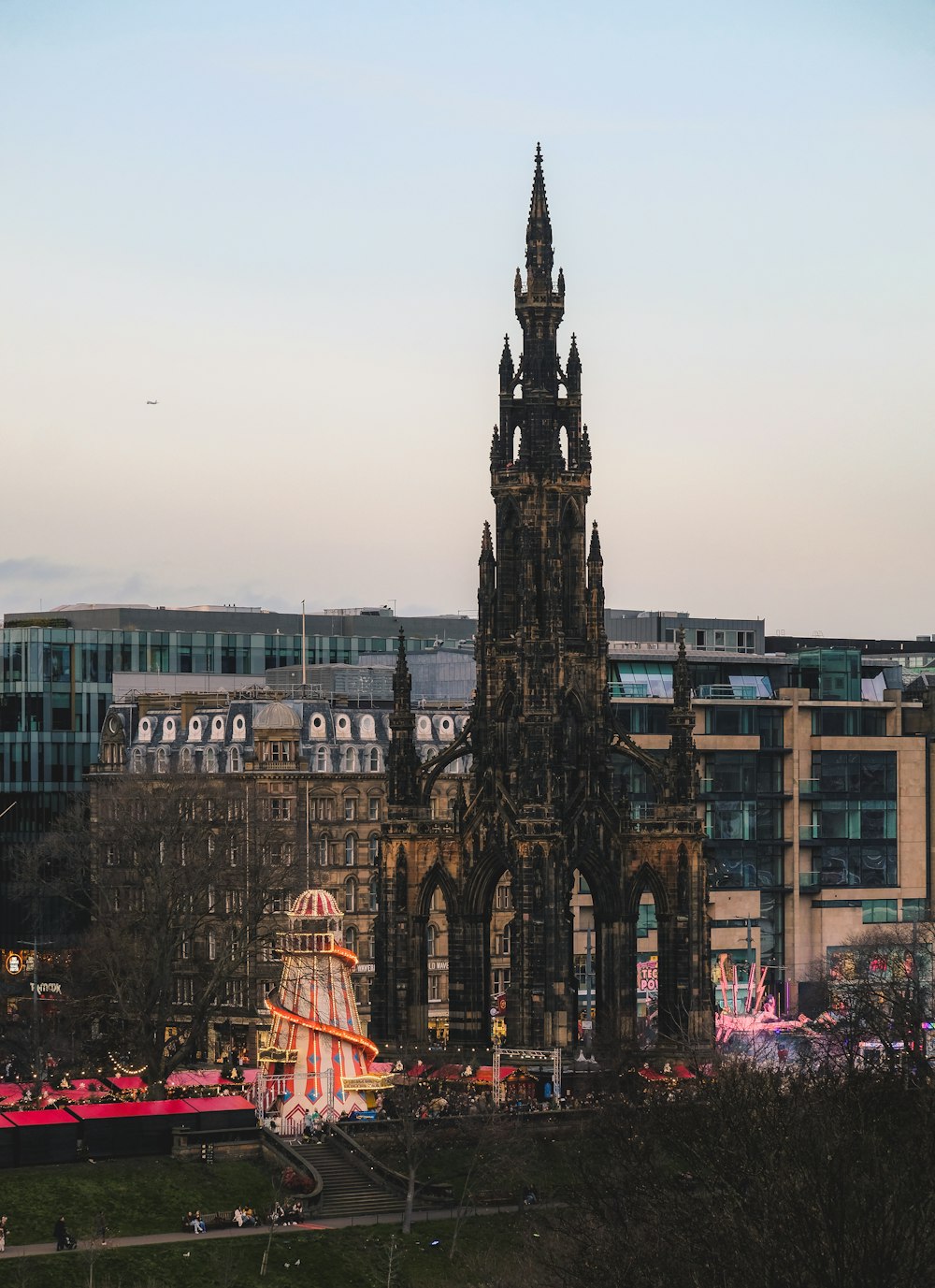 a very tall building with a giant clock on it's face