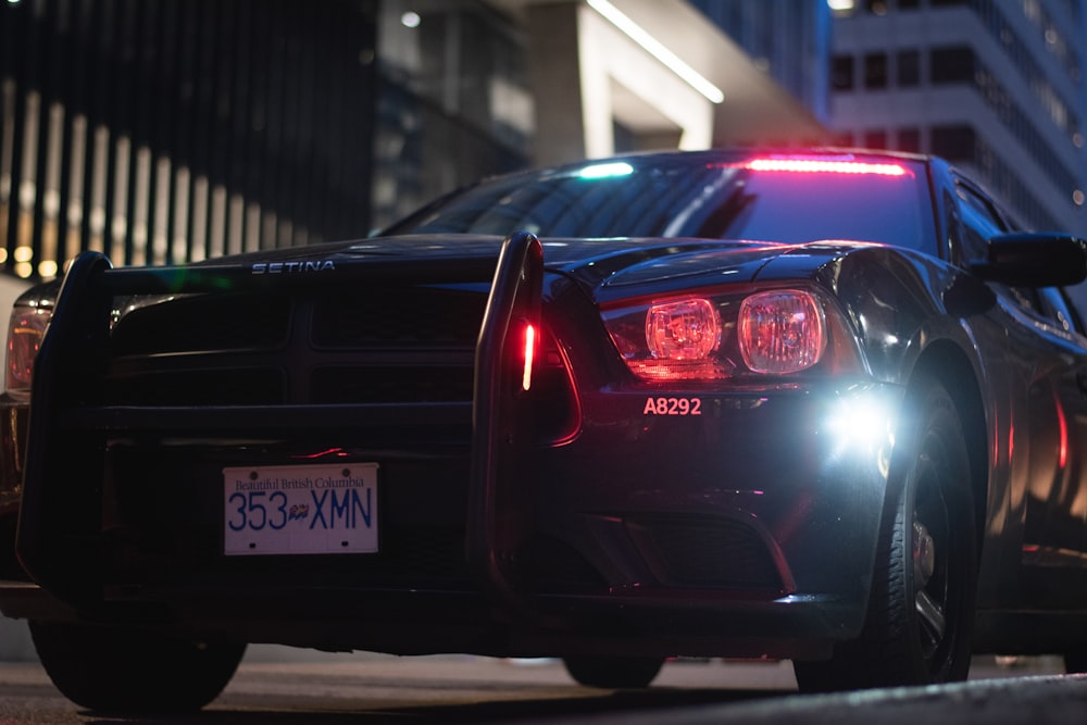 a police car parked on the side of the road