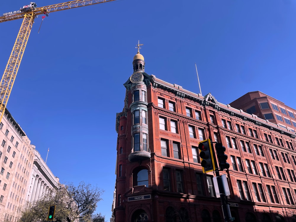 a tall building with a crane on top of it