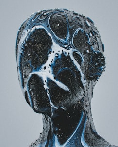 a close up of a person's face with water on it