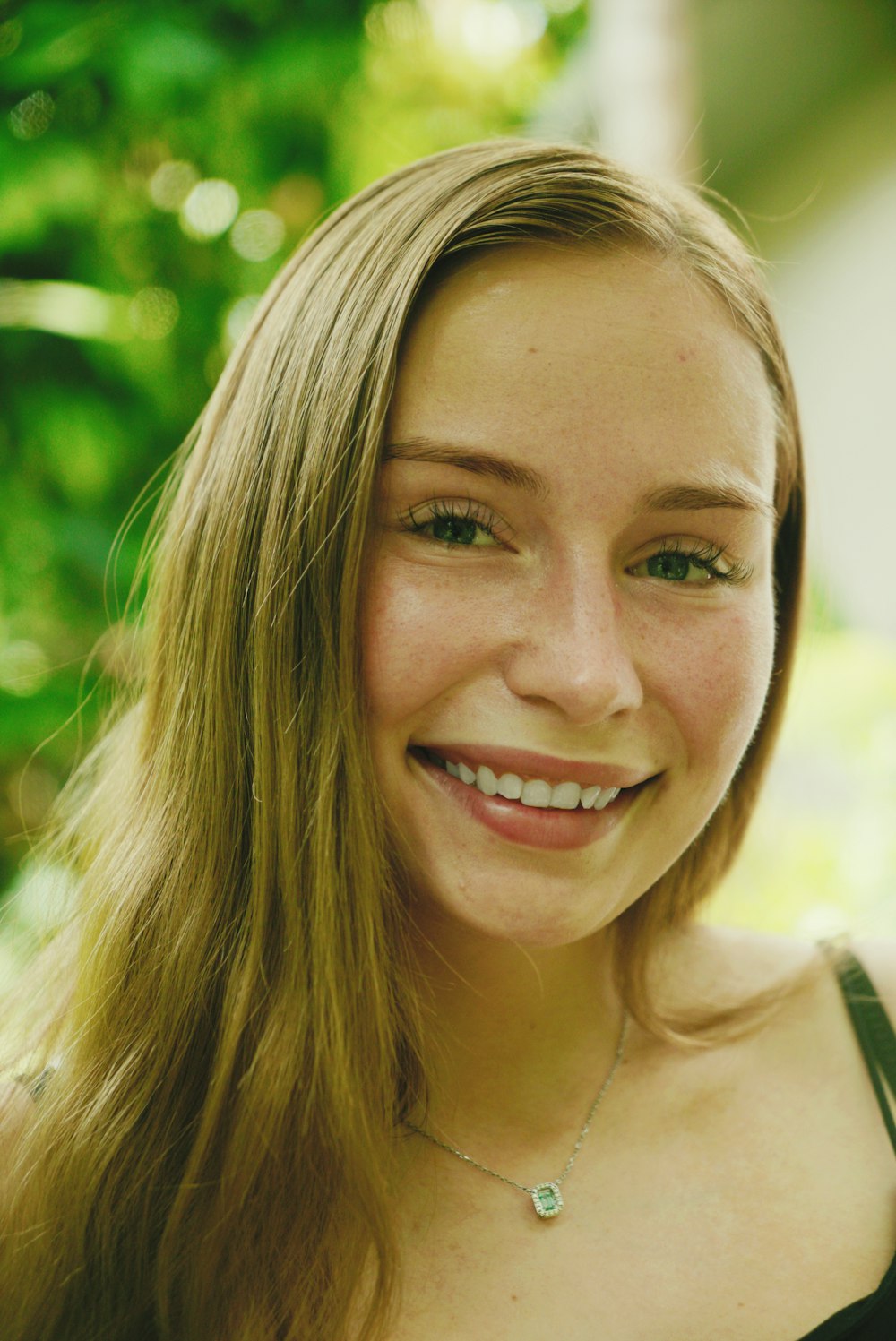 a close up of a person with a cell phone