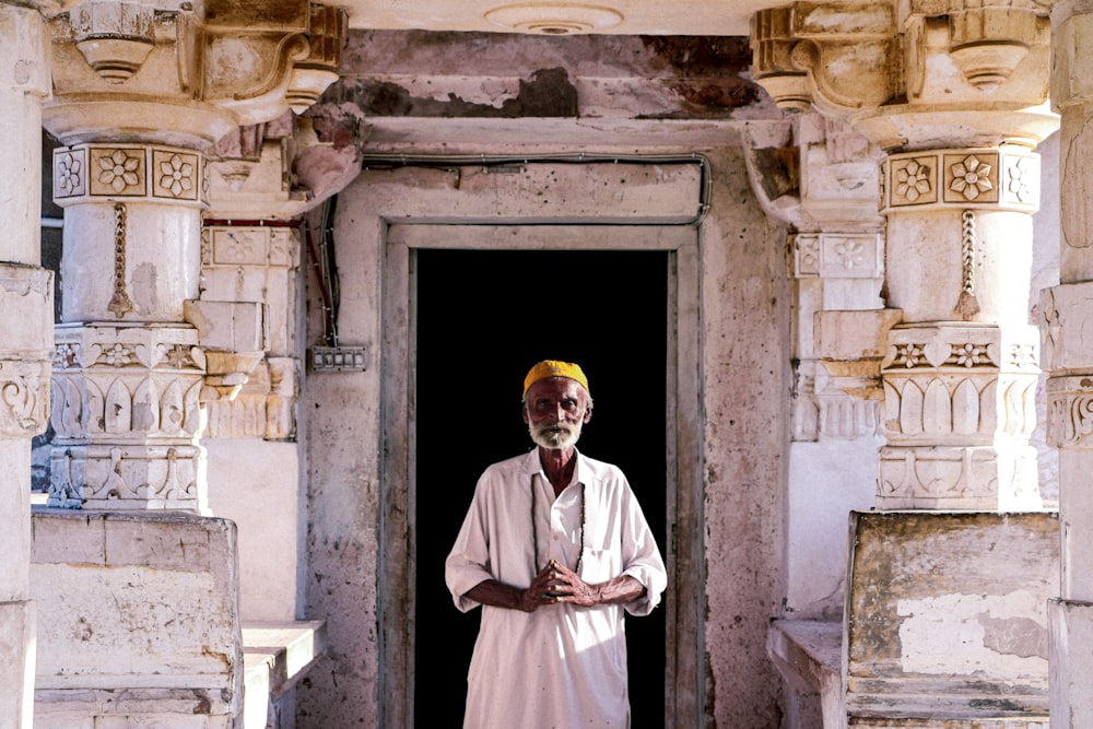a man standing in front of a doorway