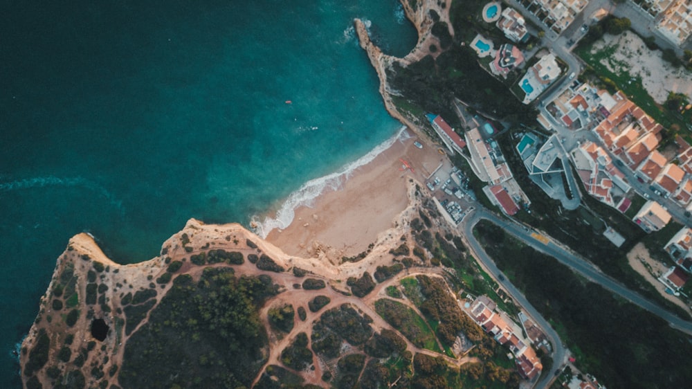 an aerial view of a beach and a city