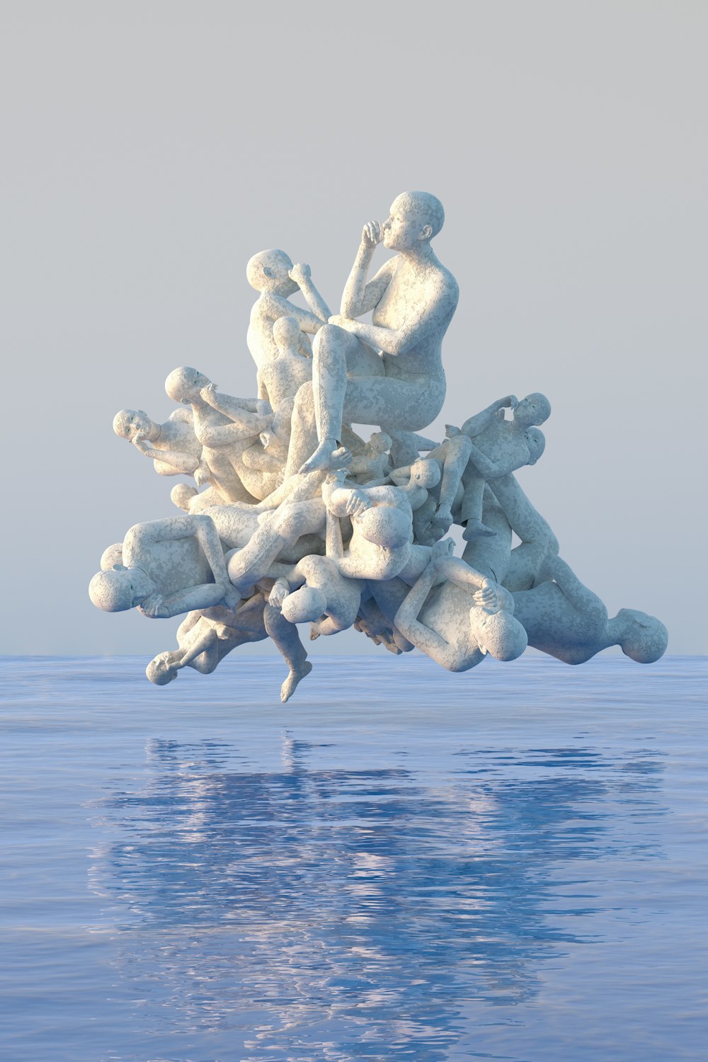 a group of white sculptures sitting on top of a body of water