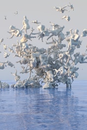 a large group of stuffed animals floating in the water