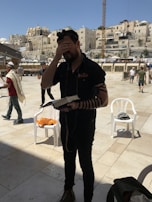 A peaceful moment of reflection as a teacher guides students through Torah study in a quiet classroom.