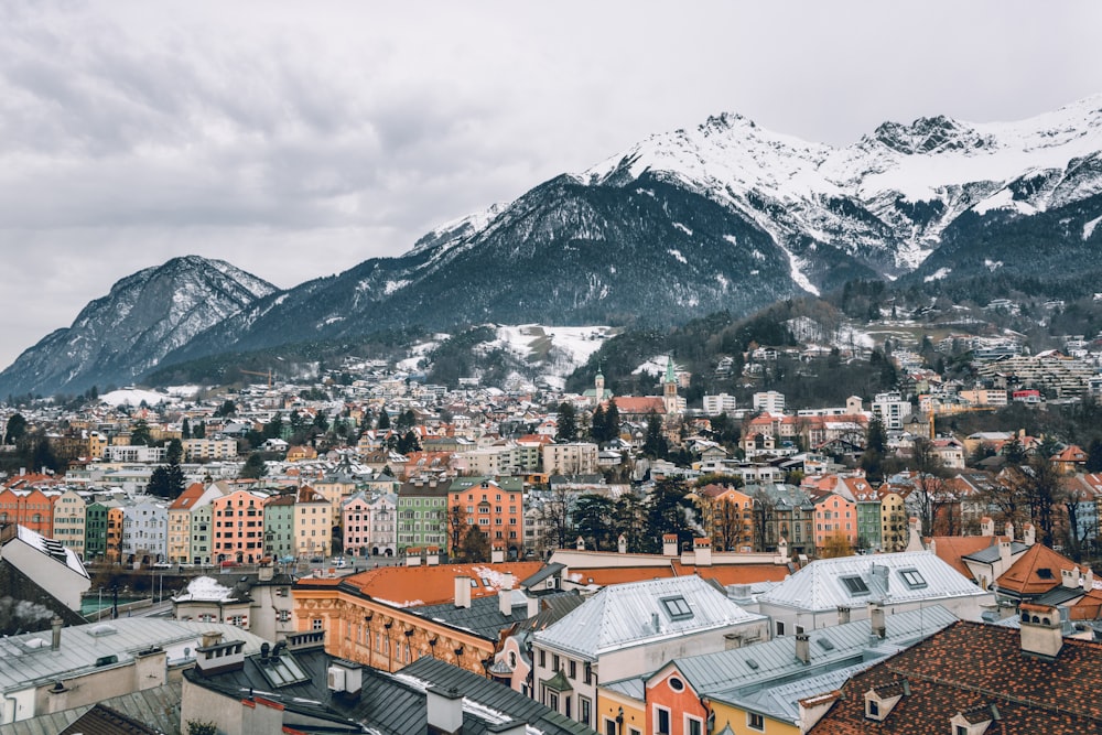 a view of a city with mountains in the background