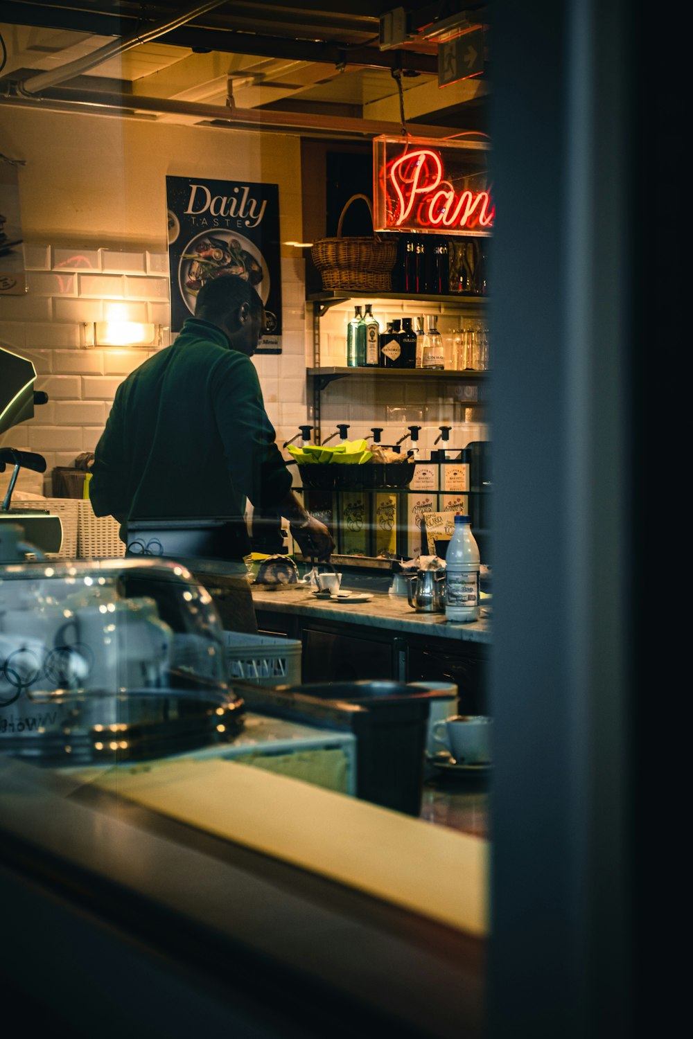 a man preparing food in a restaurant kitchen