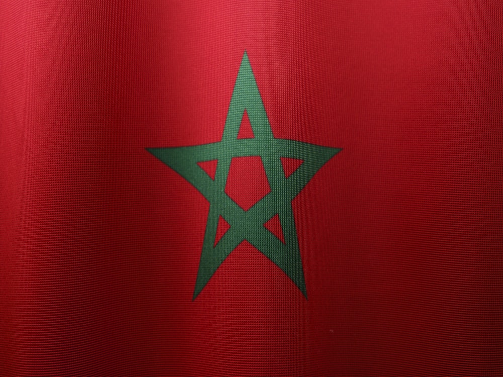 a close up of a flag with a star on it