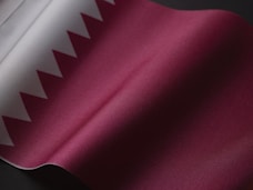a close up of a pink and white fabric