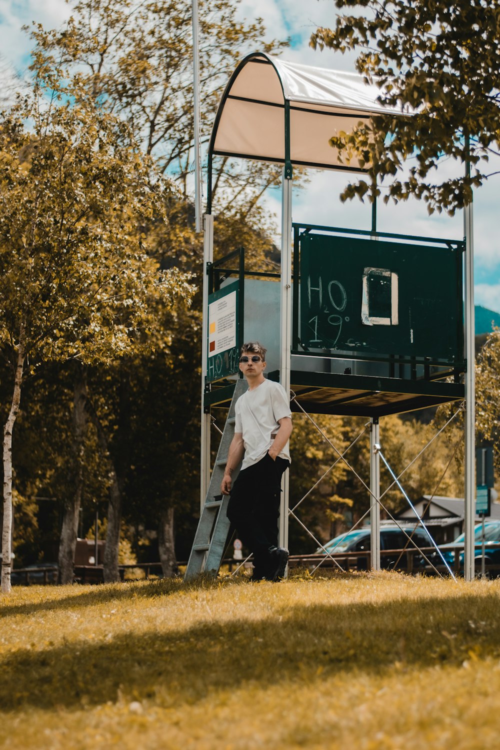 a man standing in front of a basketball hoop