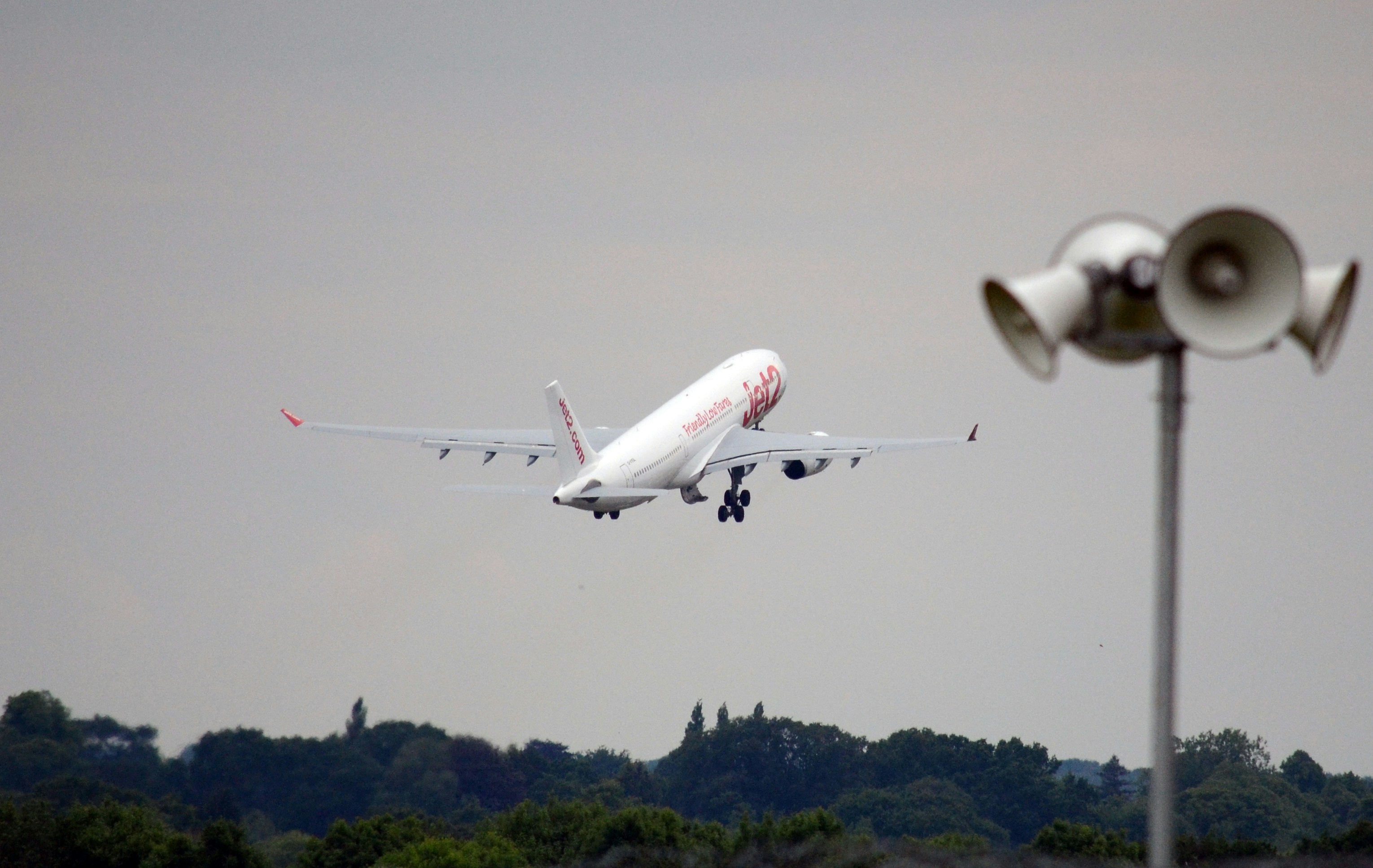 Planes landing/taking off at Manchester Airport, UK.