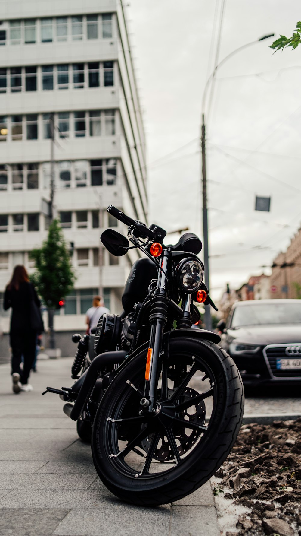 a motorcycle parked on the side of the road