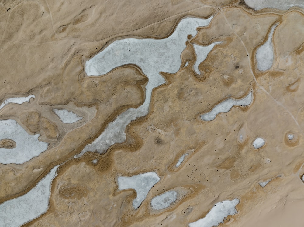 an aerial view of a brown and white area