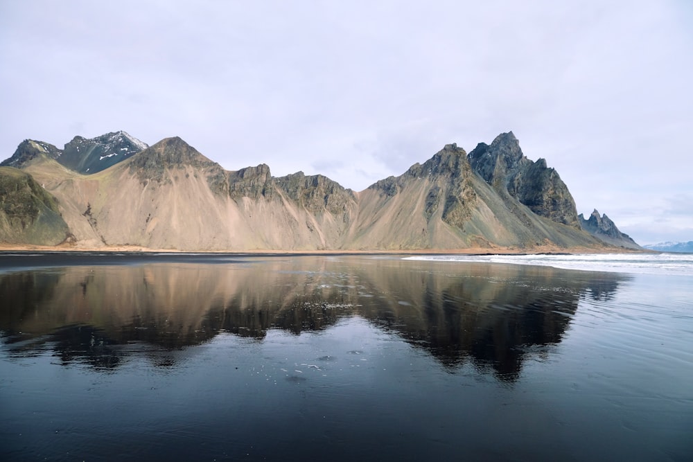 a large body of water surrounded by mountains