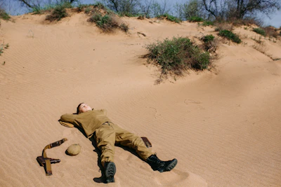 Forces deployed in desert terrain, coordinating movements under harsh sunlight.