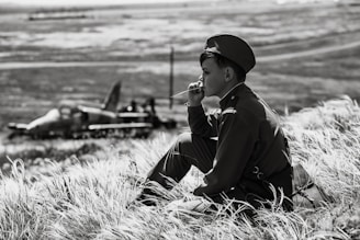 Siddhesh gazing at the horizon in a military-style jacket, embodying his dream.