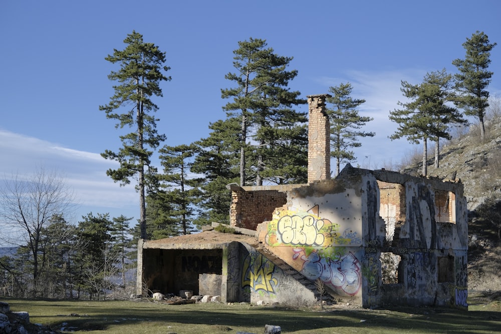 a run down building with graffiti on it