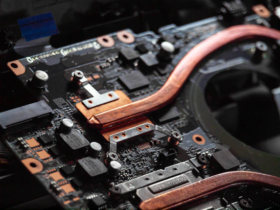 Close-up of a sleek, modern power system circuit board highlighting modular components and cooling elements.