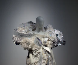 A close-up of a beautifully detailed fusion dance costume draped elegantly on a mannequin.