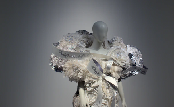 A photo of a mannequin dressed in a sleek, modern female outfit designed by Vivaveste.